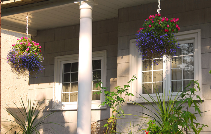Bring the garden into your space with potted and hanging floral baskets.